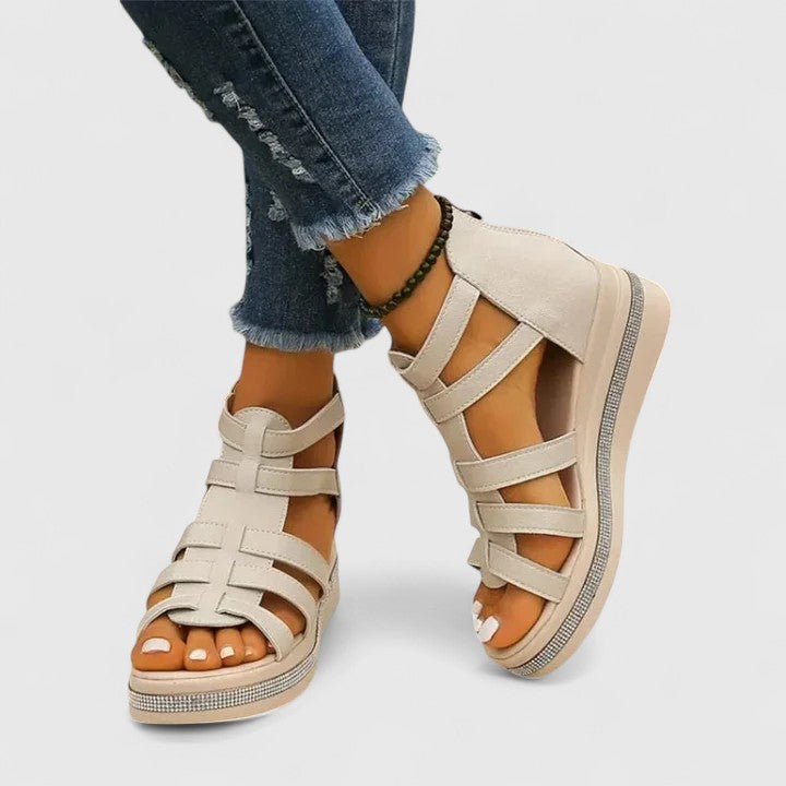 Sparkling rhinestone women's sandals. Orthopaedic wedge for comfortable, stylish, and breathable summer footwear.
