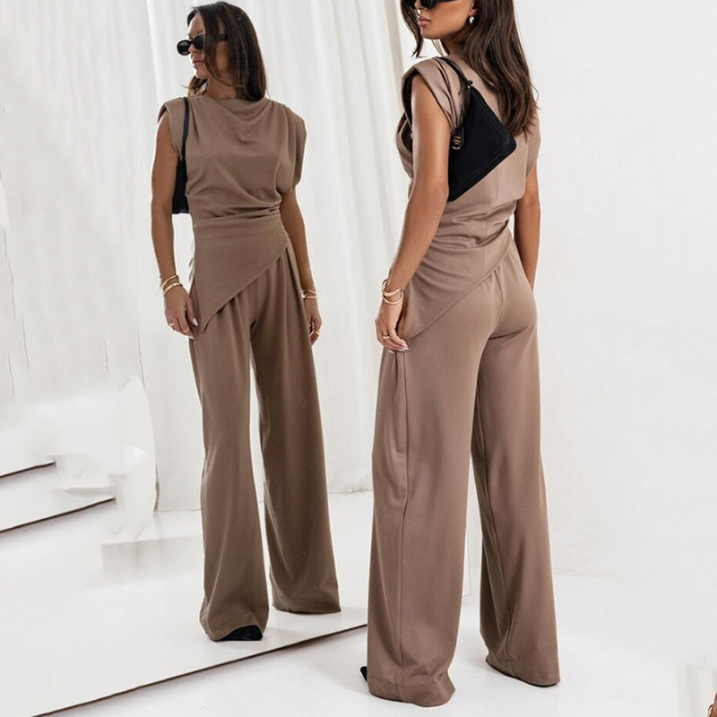Fashionable women's co-ord set: sleeveless top and wide-leg trousers. Perfect elegant summer attire.