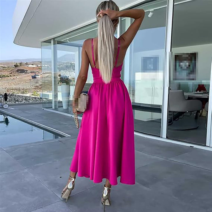 Stylish women's midi dress, featuring delicate spaghetti straps and a chic high slit for special occasions.