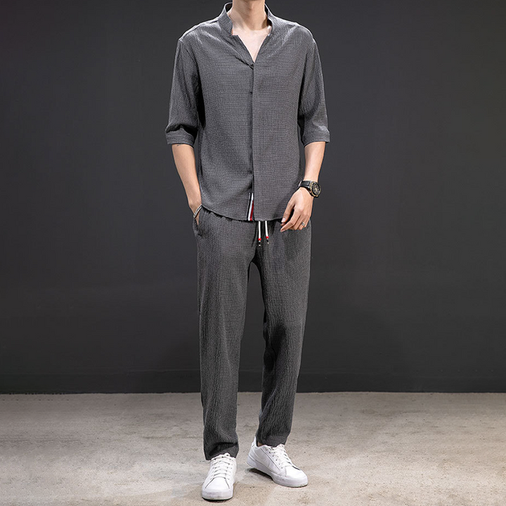 Men's V-neck linen blend shirt paired with comfortable drawstring pants, a relaxed fit two-piece outfit set.