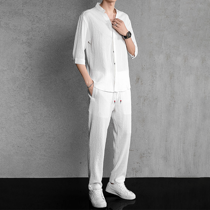 Men's relaxed fit linen blend two-piece set, V-neck shirt & drawstring pants for casual summer wear.