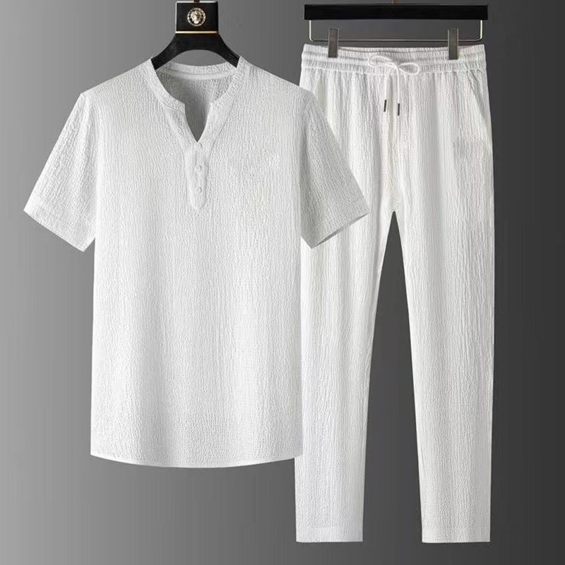 Men's relaxed fit linen blend outfit set. V-neck top & drawstring pants for comfortable, stylish summer wear.