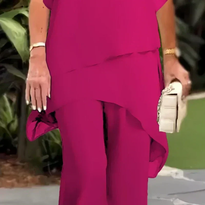Elegant women's ensemble: chic two-piece set with a relaxed layered top & wide-leg pants. Comfortable fashion.