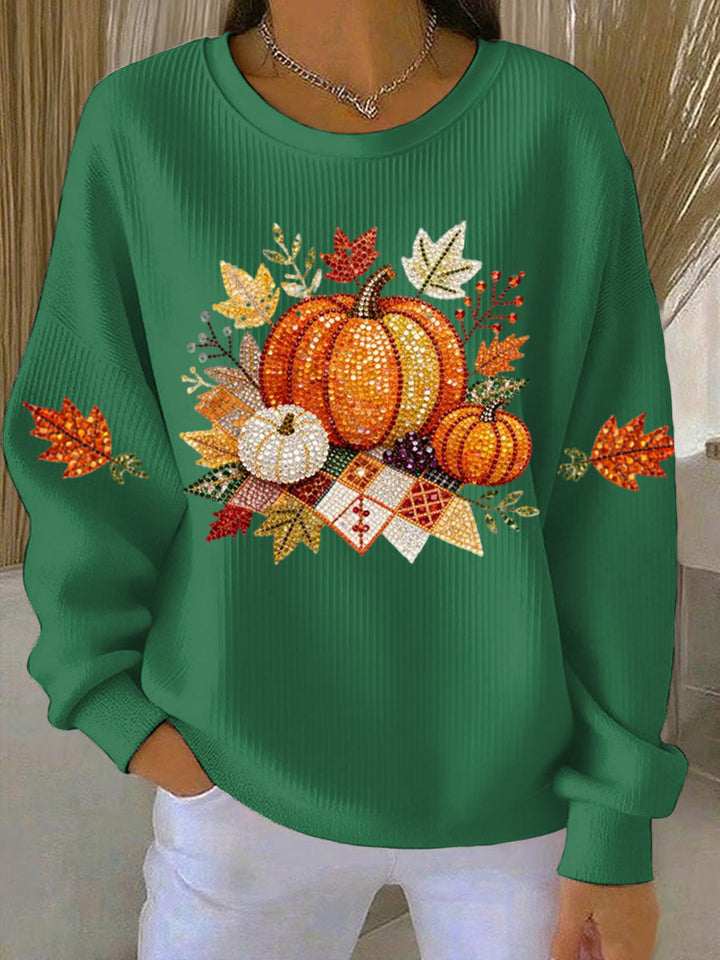 Full view of a women's relaxed fit pumpkin graphic sweatshirt, a comfy long-sleeve top for fall fashion.