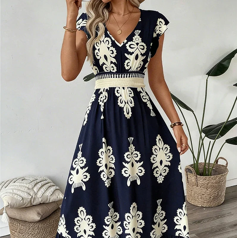 Woman in elegant embroidered midi summer dress, V-neck, flared, enjoying a day out.