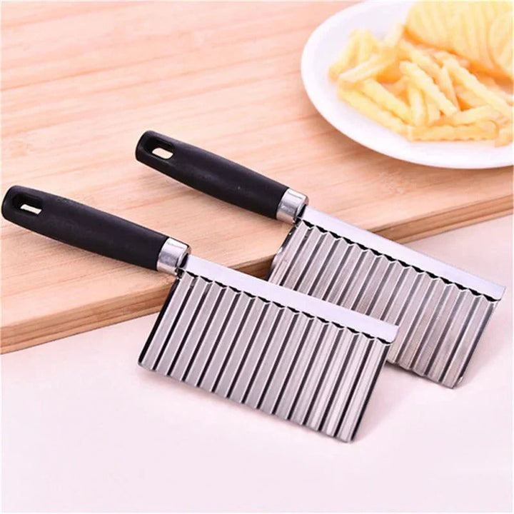 "Stainless steel crinkle cutter knife with a sleek blade, perfect for slicing vegetables and fruits with ergonomic handle."