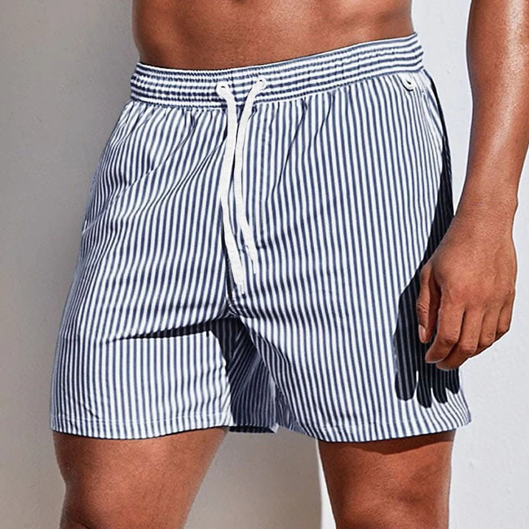 Comfortable men's beach shorts, designed for warm weather with a relaxed fit. Ideal for versatile summer fashion.