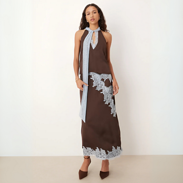Women's chic brown halter top & flowing maxi skirt two-piece set, perfect for elegant summer style.