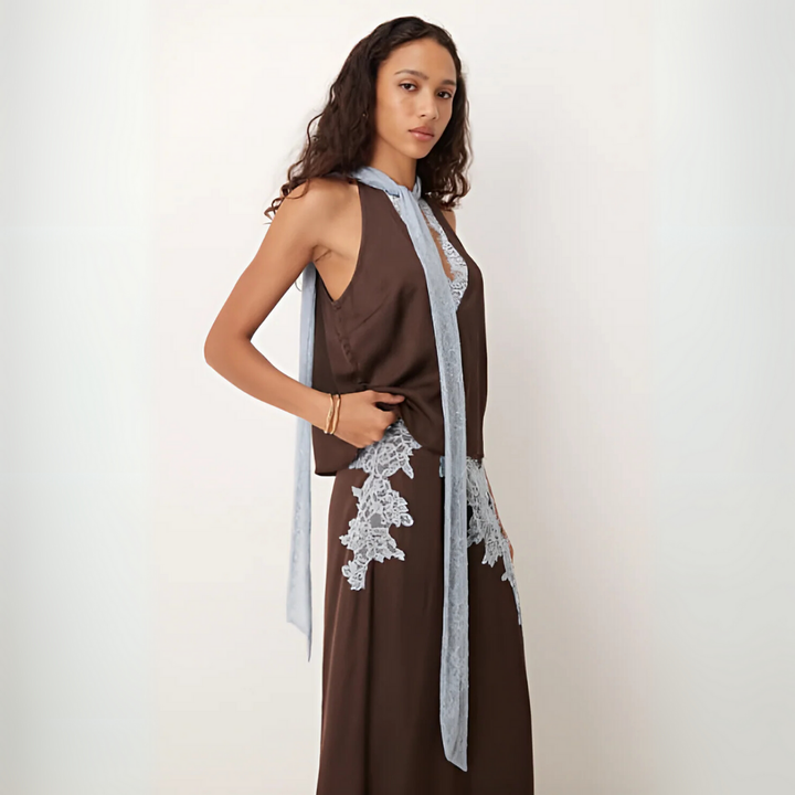 Elegant brown two-piece set: women's halter top & maxi skirt, ideal for parties & summer vacations.