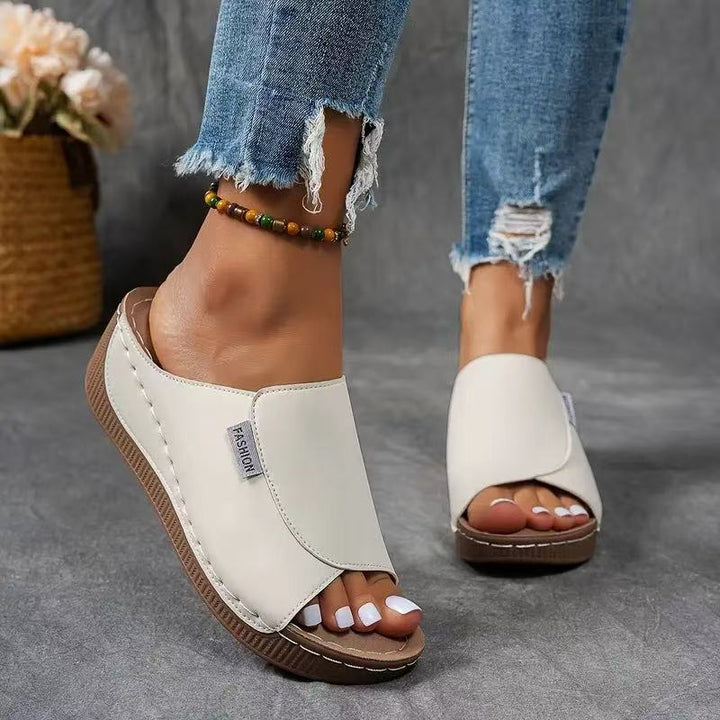 Modern sage women's sandals, chic open-toe design, lightweight and comfortable for stylish summer footwear.