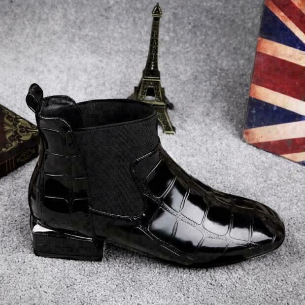 Durable black women's walking boots, designed for comfort and everyday wear with supportive features.
