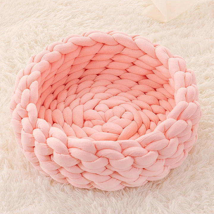 Artisan hand-woven cat bed. This cozy knitted pet bed offers ultimate comfort & stylish home decor.