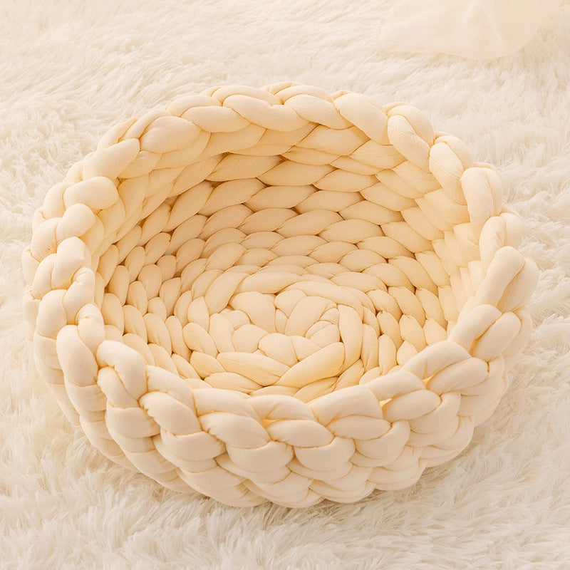 Cozy hand-woven pet bed, a stylish piece of feline furniture. Handmade cat basket for ultimate comfort.