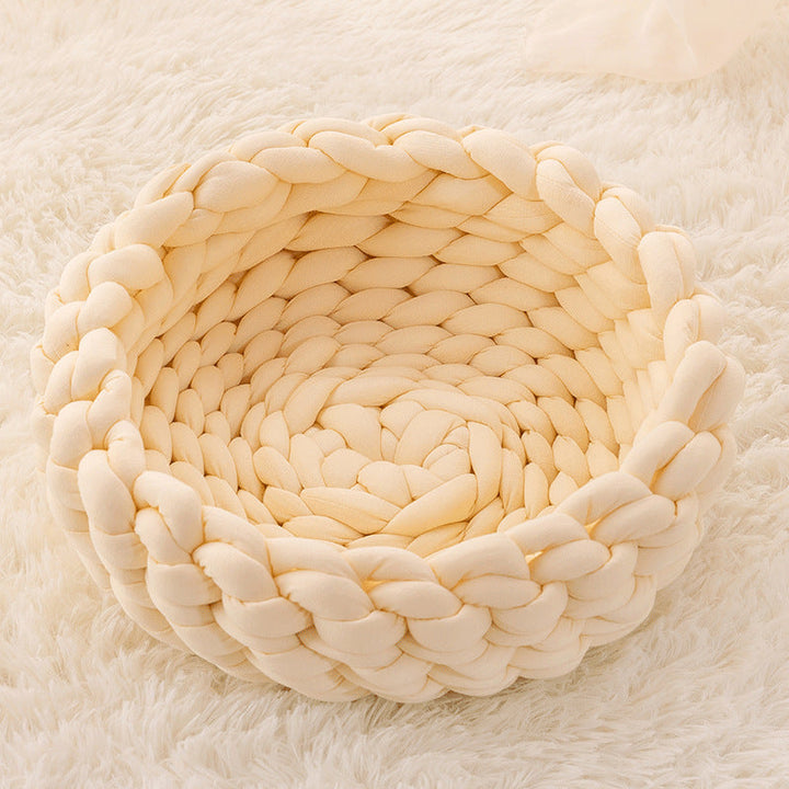 Cozy hand-woven pet bed, a stylish piece of feline furniture. Handmade cat basket for ultimate comfort.