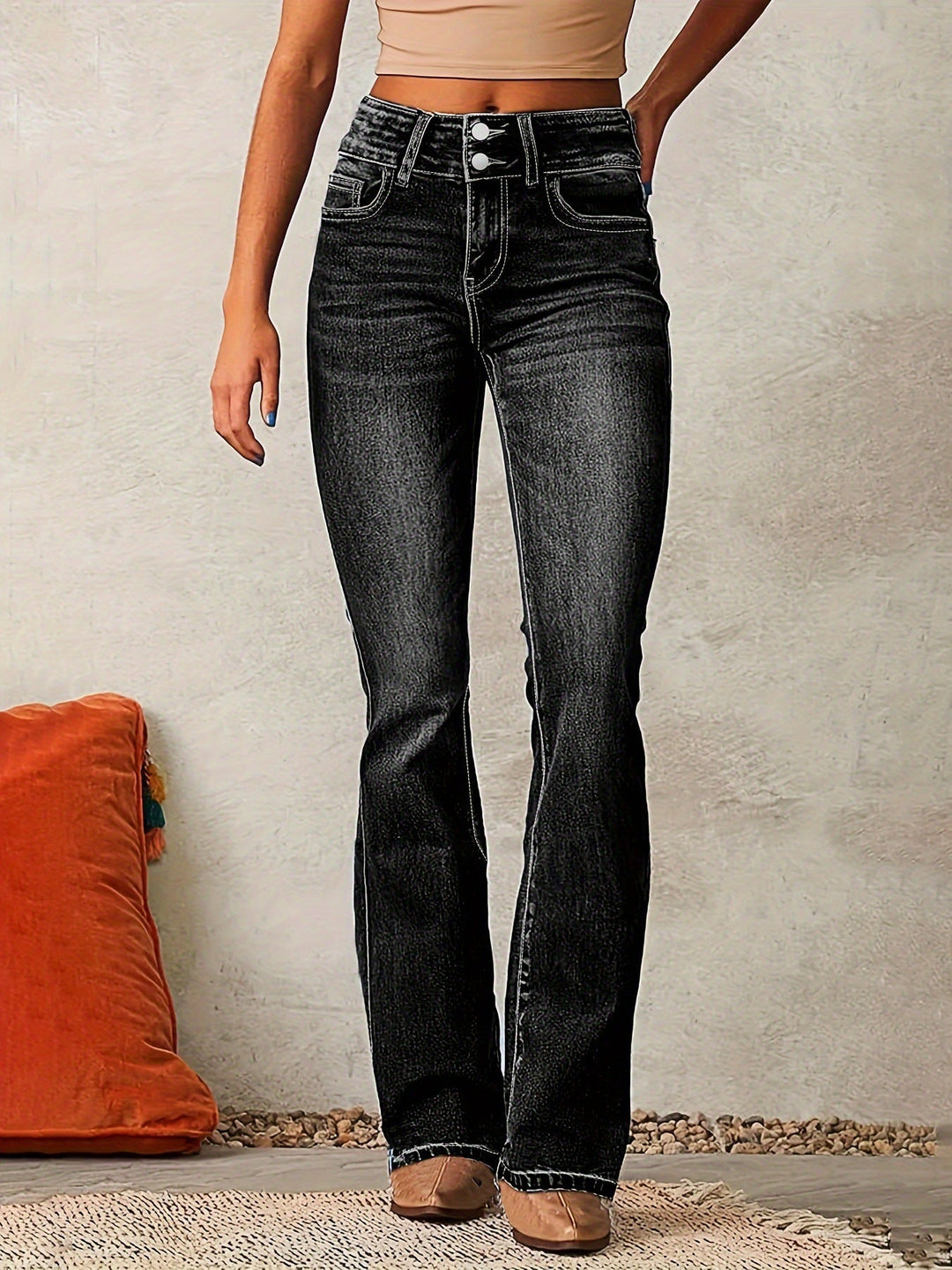 Comfortable & stylish high-waisted bootcut jeans for women, made from premium denim. Elevate your casual look.