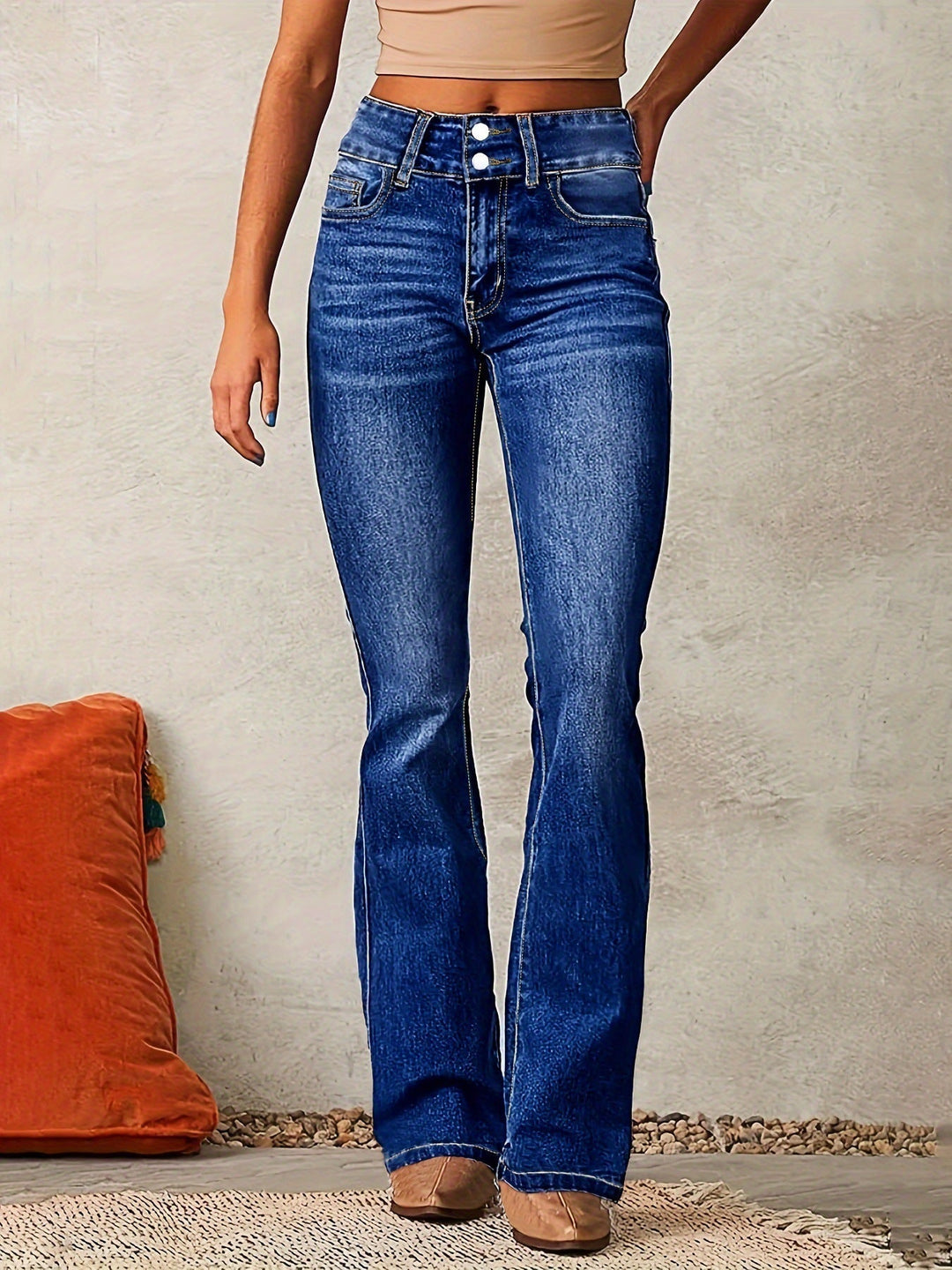 Fashion-forward women's high-waisted bootcut jeans, featuring a modern flared denim design. Chic & versatile.