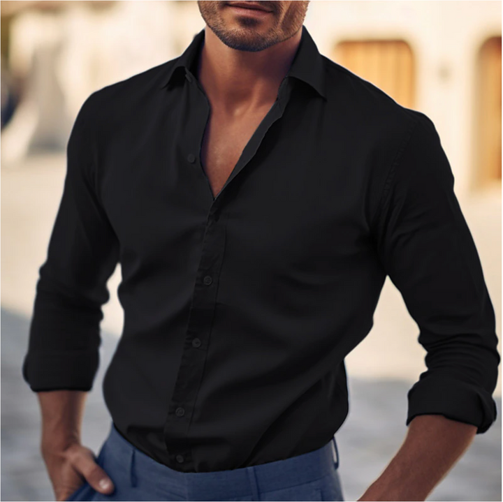 Stylish men's cotton dress shirt with classic collar, showcasing a sleek, flattering fit suitable for any occasion.