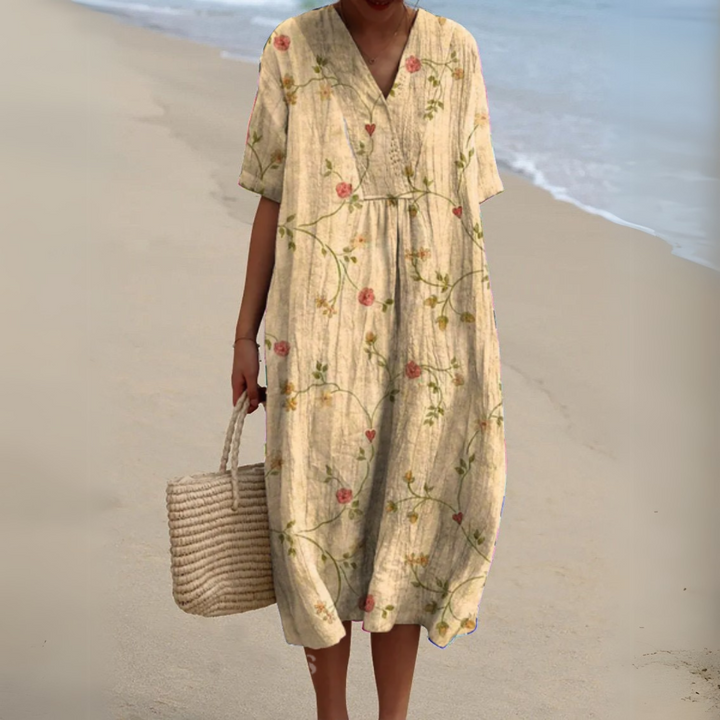 Side view of a casual women's multicolour floral V-neck dress, perfect for warm weather.