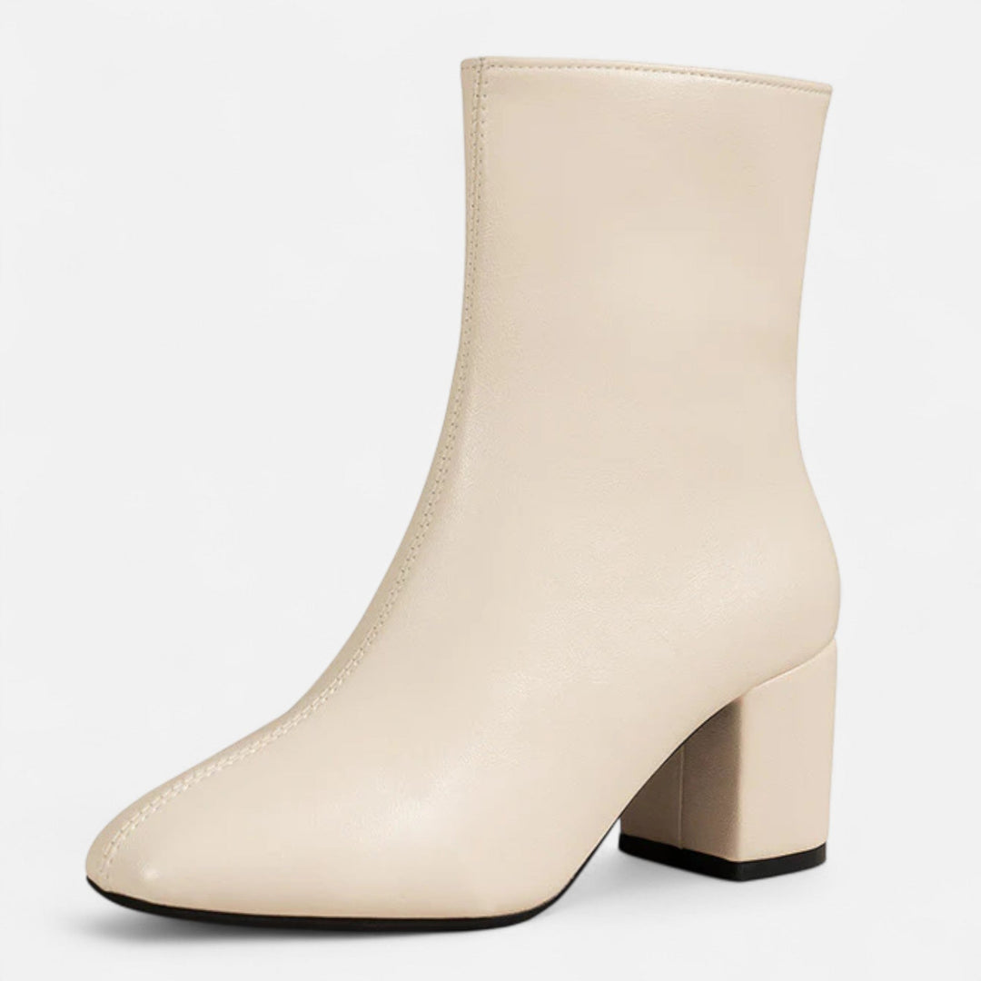 Stylish women's ankle boots with sturdy block heel & side zipper. Fashionable, comfortable, elegant footwear.