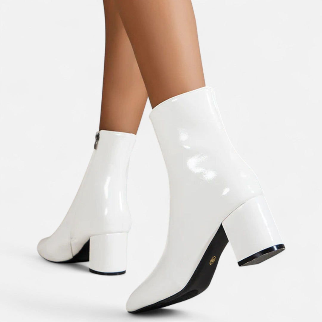 Elegant women's ankle boots with a stable block heel. Stylish, versatile, & comfortable for autumn/winter fashion.