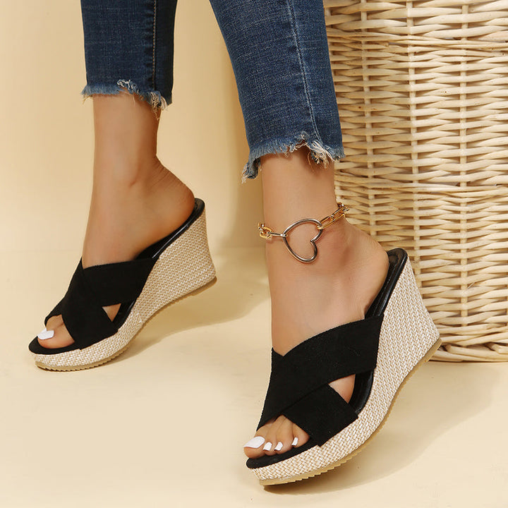 Elegant open-toe wedge sandals with cross straps for women, ideal for casual summer style and holiday outfits.