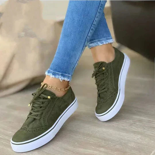 Stylish women's lace-up sneakers with arch support, perfect for comfortable everyday walking and casual wear.