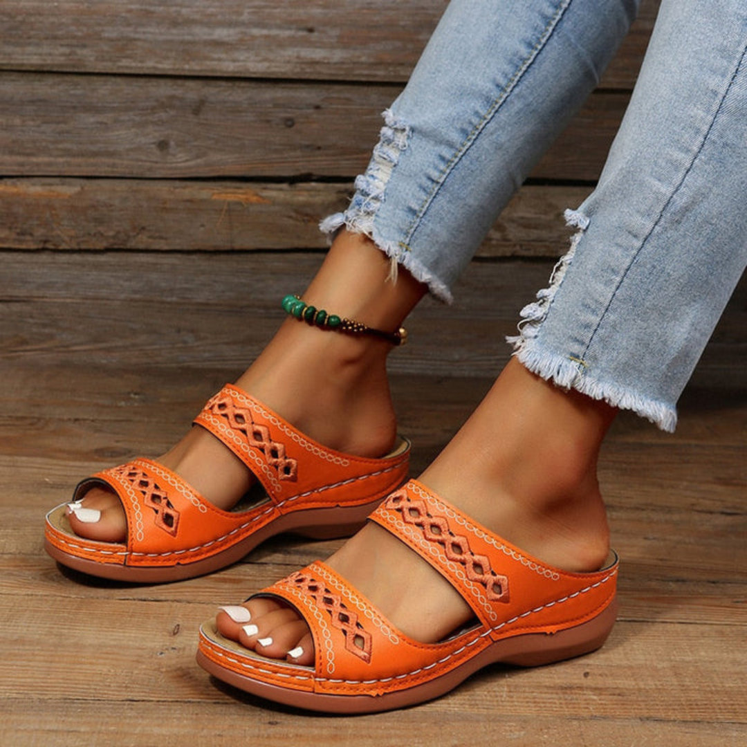 Women's orthopedic wedge sandals offering superior arch and foot support. Ideal for comfortable, stylish wear.