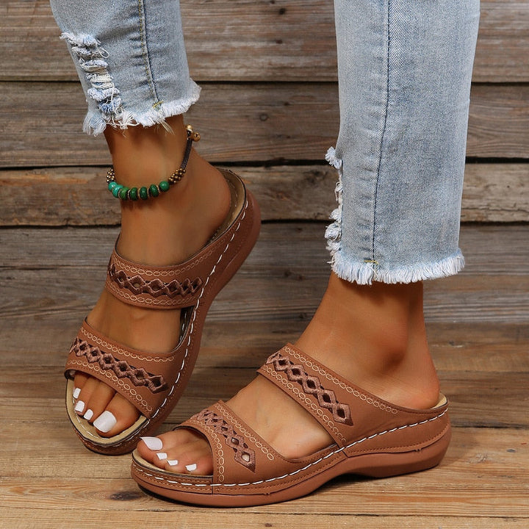 Sleek women's orthopedic sandals designed for stylish comfort & foot health. Essential casual summer footwear.