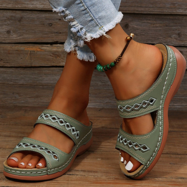 Fashionable women's orthopedic sandals providing pain relief & arch support. Enjoy stylish comfort all day.