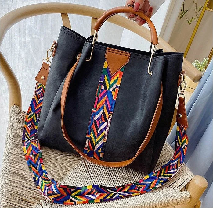 Elegant brown PU leather tote bag for women, spacious daily carry shoulder bag.