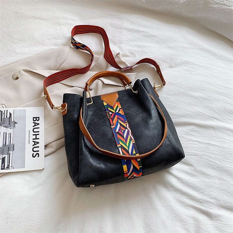 Stylish green PU leather everyday tote bag, perfect for work or travel.