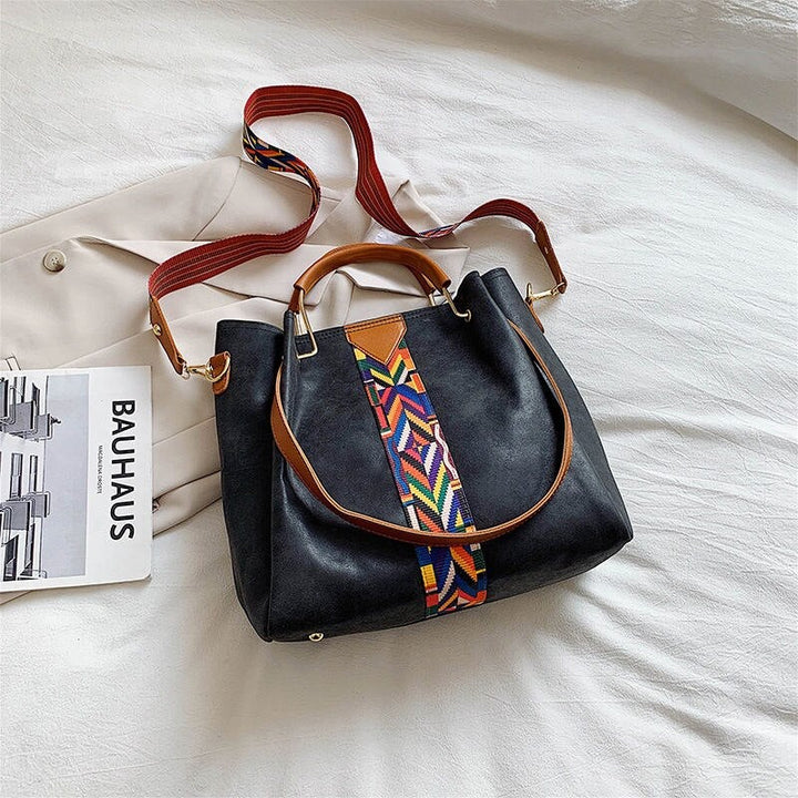 Stylish green PU leather everyday tote bag, perfect for work or travel.