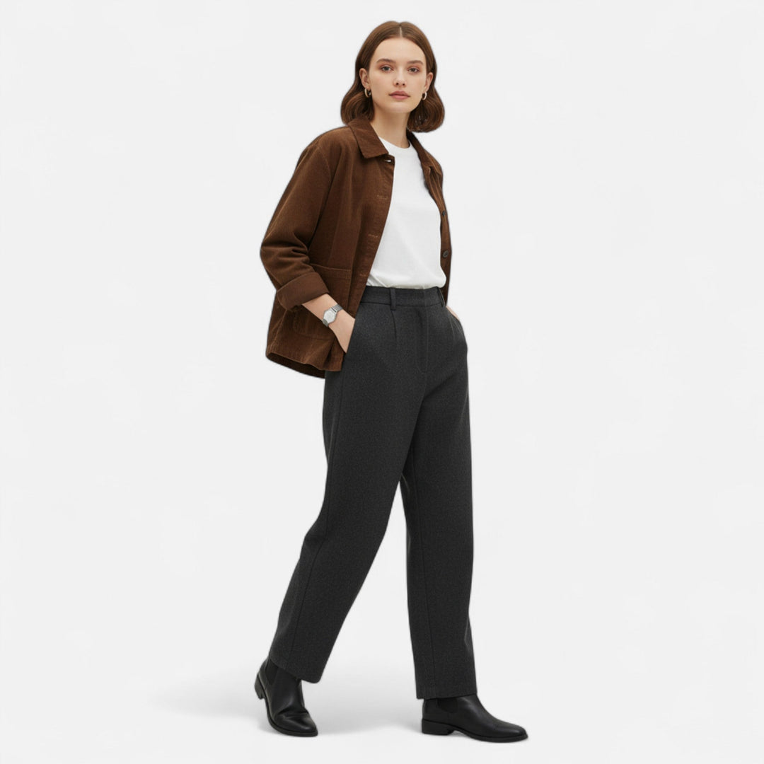 Elegant women's tailored short jacket. Chic and stylish ladies' outerwear, ideal for versatile seasonal fashion.
