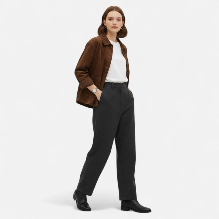 Elegant women's tailored short jacket. Chic and stylish ladies' outerwear, ideal for versatile seasonal fashion.