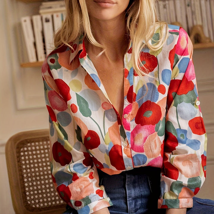 "Stylish Women's Floral Print Blouse in red and pink, lightweight fabric, front view showcasing button-down and long sleeves.