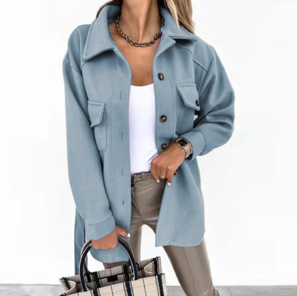Stylish women's mid-season jacket with slim fit, zip closure, in spring shades enhancing a chic and modern silhouette.