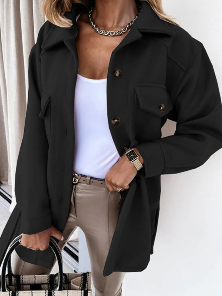 Stylish women's mid-season jacket with slim fit, zip closure, in spring shades enhancing a chic and modern silhouette.