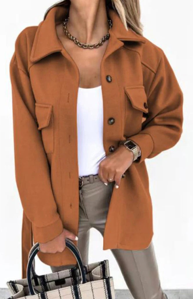 Stylish women's mid-season jacket with slim fit, zip closure, in spring shades enhancing a chic and modern silhouette.