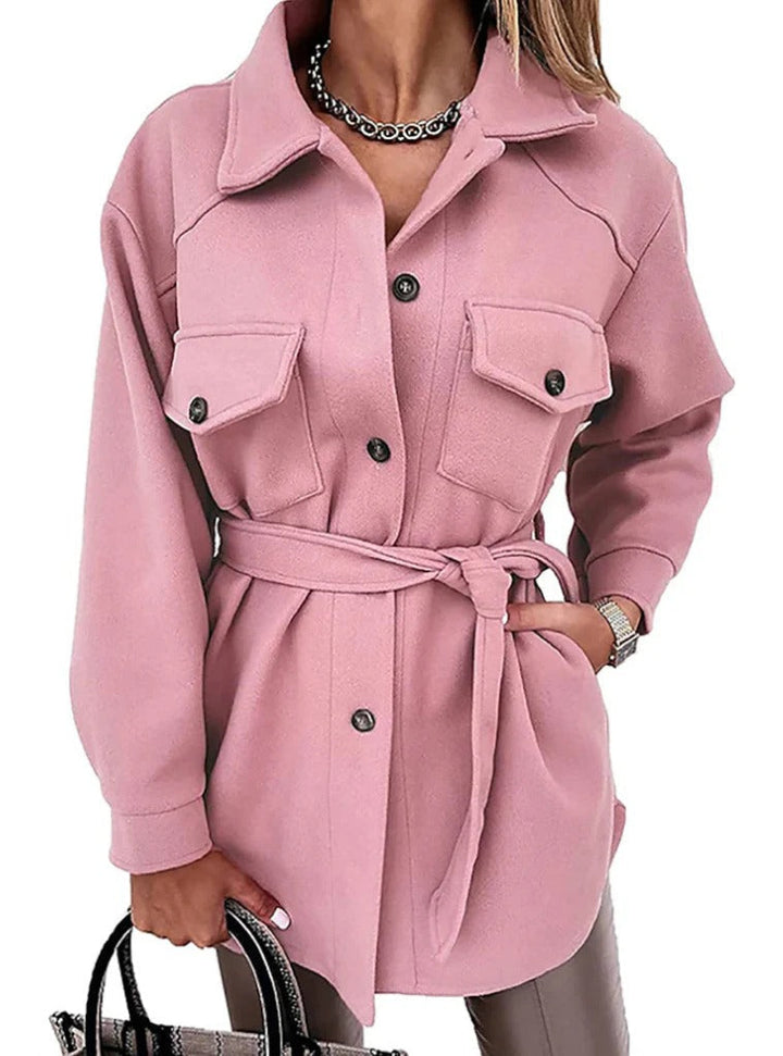 Stylish women's mid-season jacket with slim fit, zip closure, in spring shades enhancing a chic and modern silhouette.