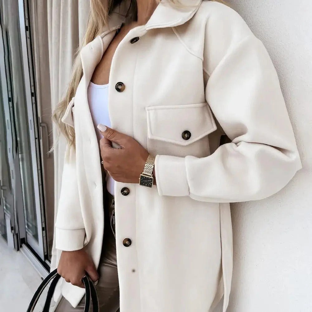 Stylish women's mid-season jacket with slim fit, zip closure, in spring shades enhancing a chic and modern silhouette.