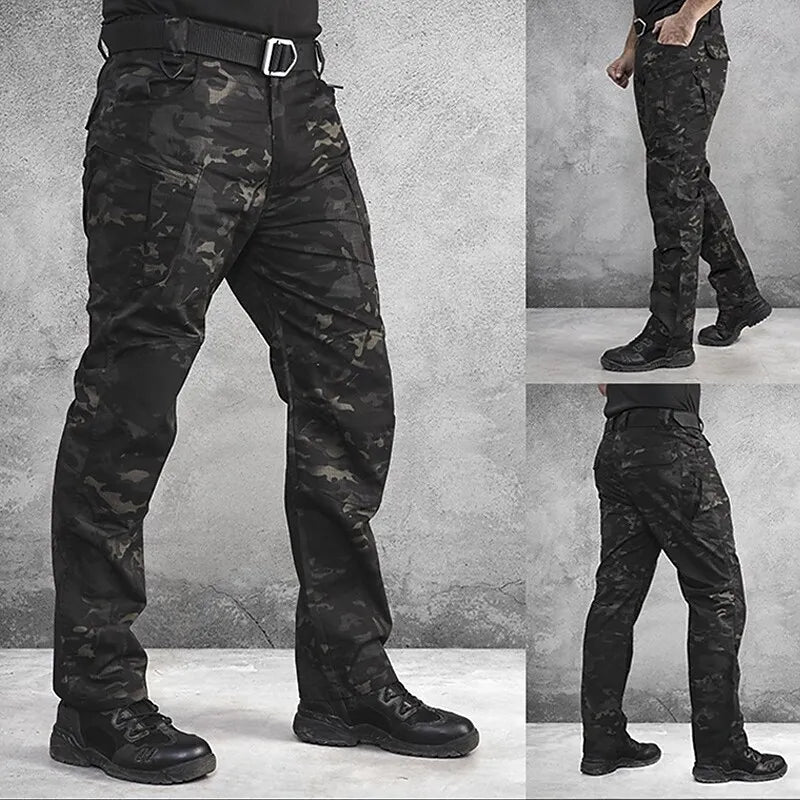 Men's military tactical cargo pants in olive green, featuring multiple pockets for adventure and outdoor activities.