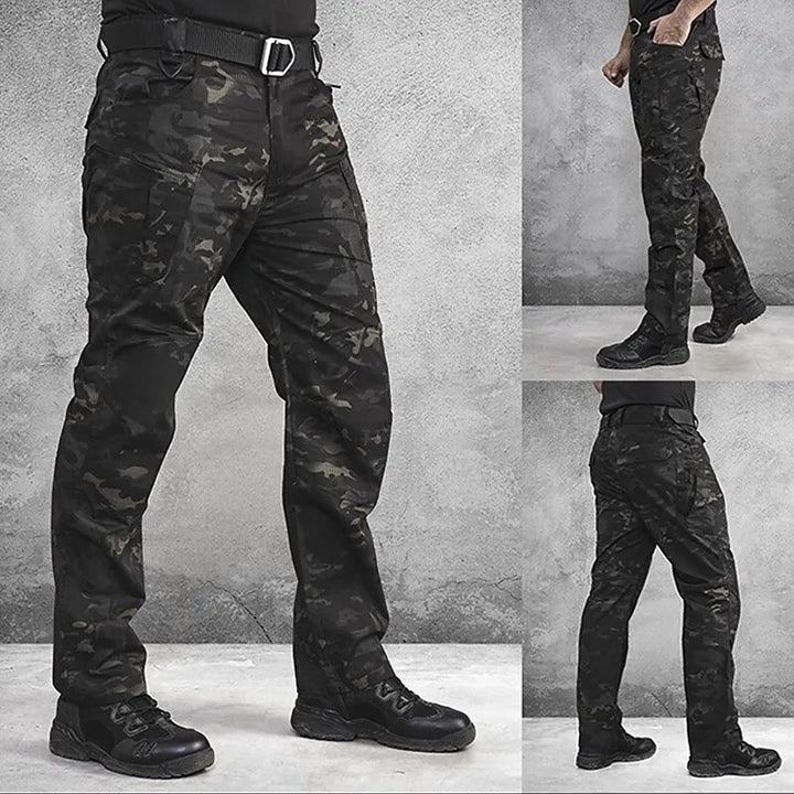 Men's military tactical cargo pants in olive green, featuring multiple pockets for adventure and outdoor activities.