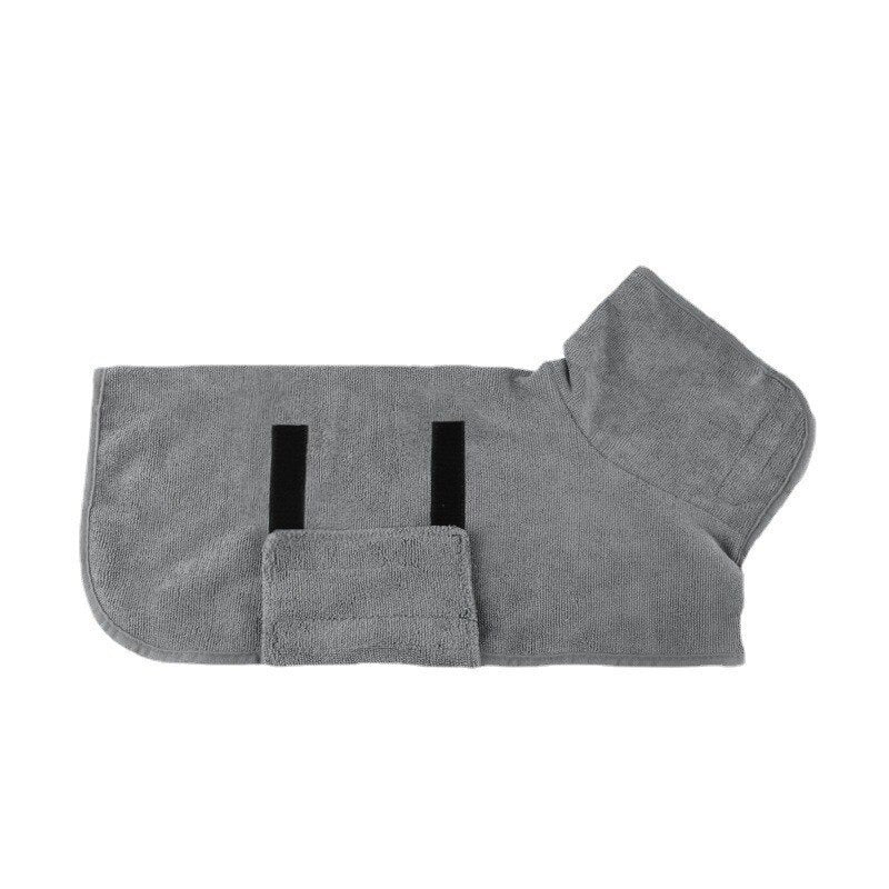 Happy dog in super absorbent drying towel robe; ideal for quick pet baths & grooming comfort.