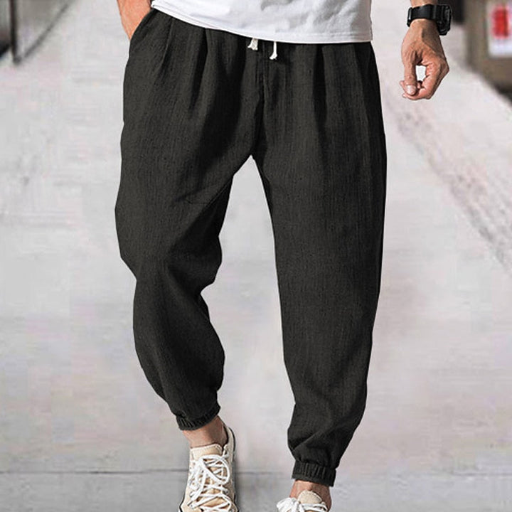 Athletic men's jogging pants, ideal for activewear, workouts, or versatile casual lounge wear.
