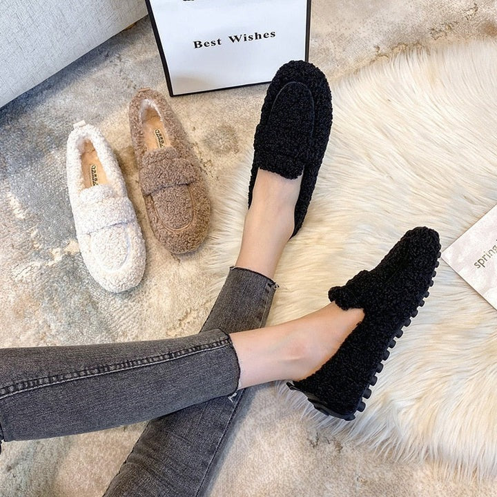 Unisex plush orthopedic comfort slippers for indoor relaxation and supportive home footwear.