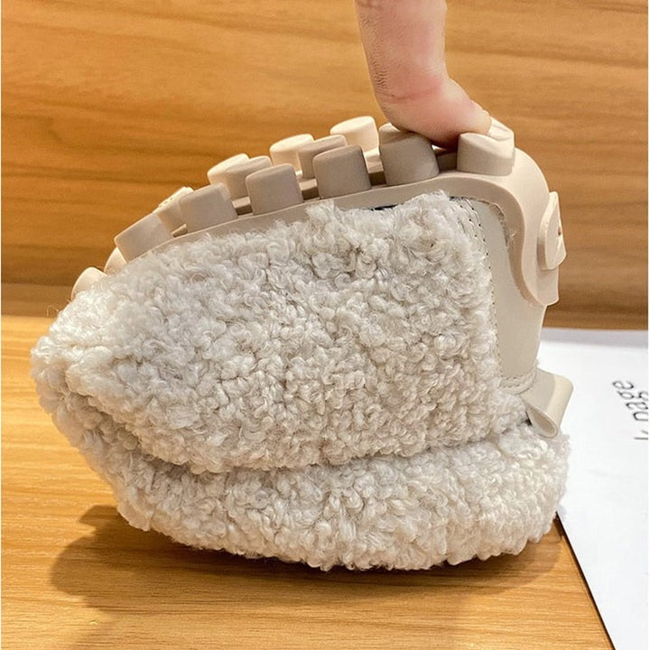 Supportive orthopedic indoor slippers, plush and cozy for unisex comfort and relaxation at home.
