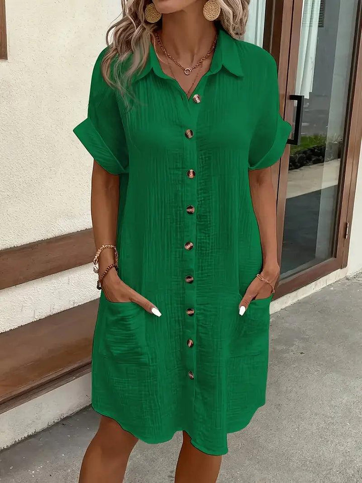 Comfortable women's V-neck shift blouse dress, essential for spring casual elegance.