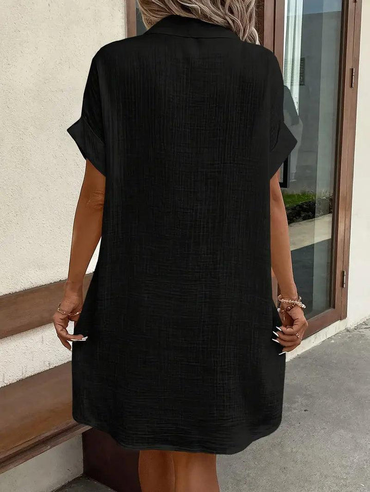 Everyday women's V-neck blouse dress, comfortable & stylish for casual wear.