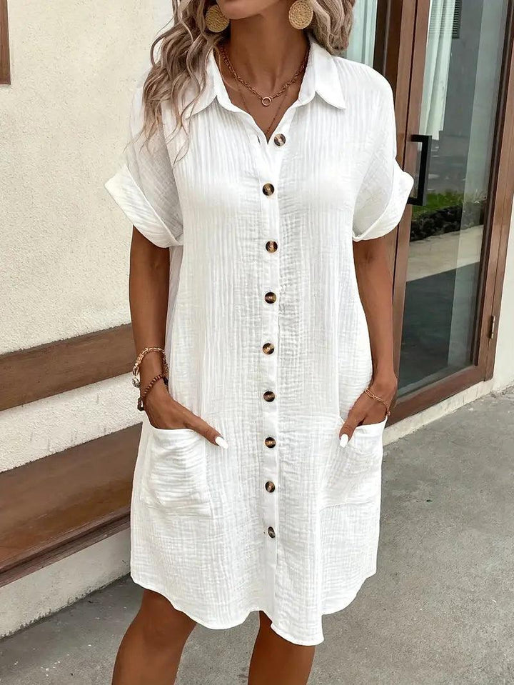 Versatile women's V-neck shift dress, ideal for smart casual or spring wear.