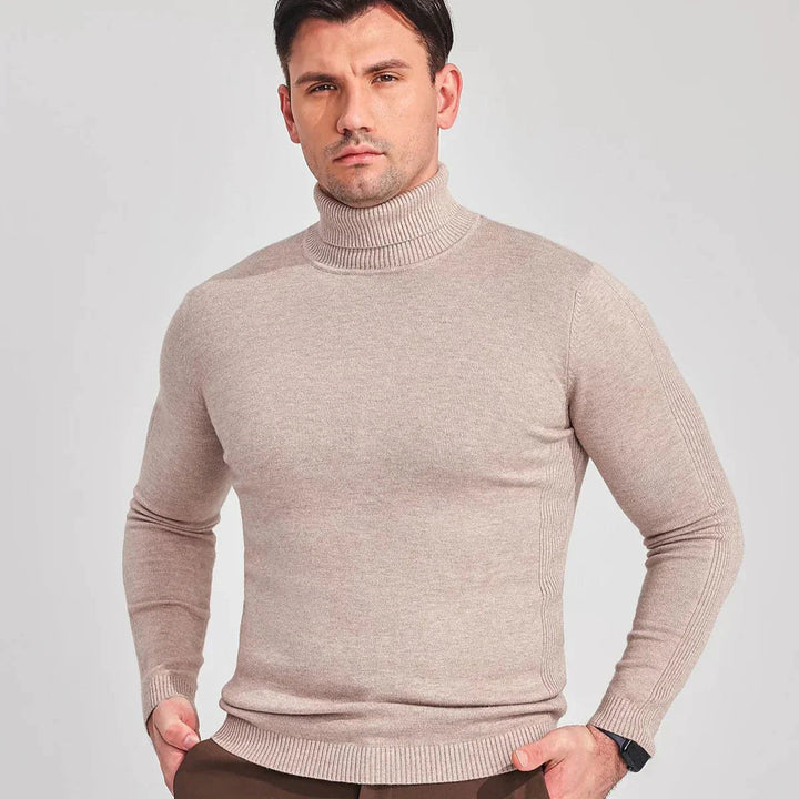 Autumn/winter men's roll neck jumper, featuring a comfortable fit & classic design.